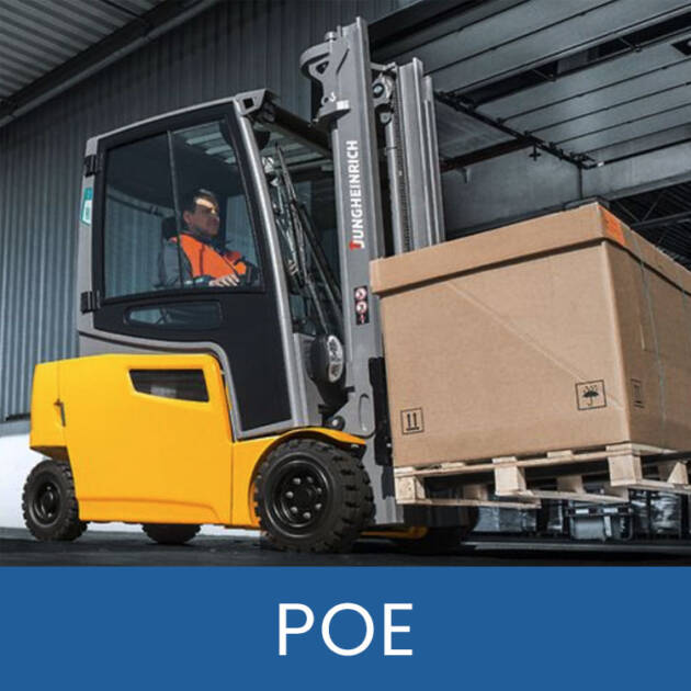 Worker driving a fork lift